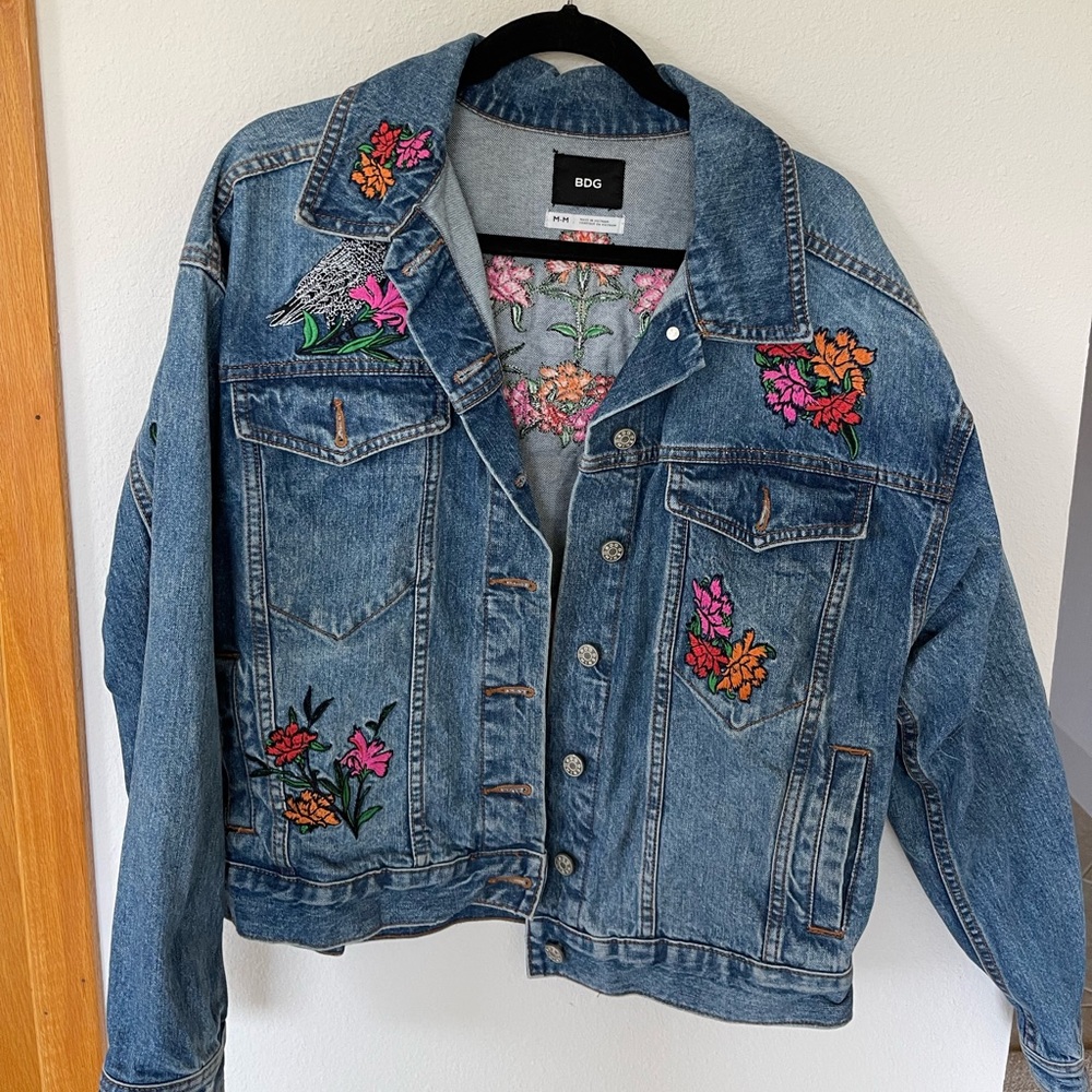 Urban Outfitters embroidered skull and flower jean jacket